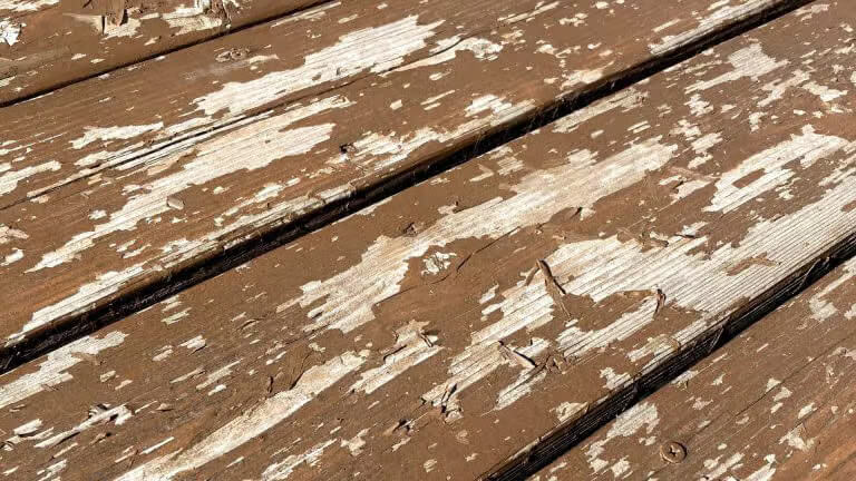 Removing peeling paint from a wooden deck